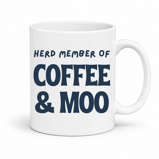 A white ceramic coffee mug with the text 'HERD MEMBER OF COFFEE & MOO' printed in dark navy blue, shown on a clean white background. Grab your mug from Coffee and Moo NZ.