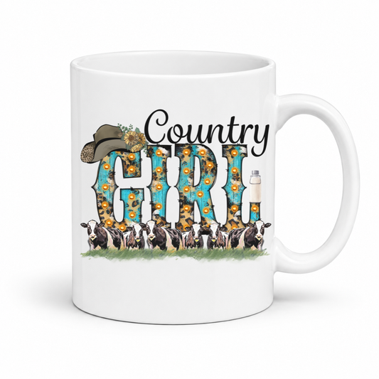 A white ceramic coffee mug featuring a 'Country Girl' graphic design with sunflowers, a cowboy hat, milk bottles, and a line of cows, shown on a plain white background. From Coffee and Moo NZ