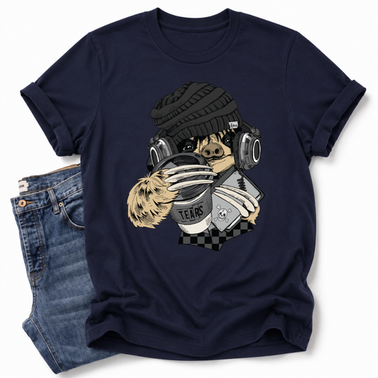 A navy blue short-sleeve t-shirt with a graphic of a sloth wearing a beanie, headphones, and holding a cup of coffee, styled flat-lay next to a pair of blue jeans on a white background. Grab your emo sloth tee from Coffee and Moo NZ.