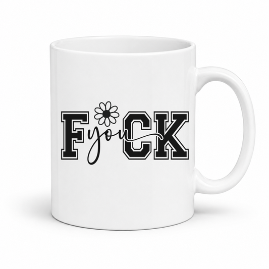 Fuck You Funny Coffee Mug showing the full black-and-white "Fuck you" design with a daisy accent, from Coffee and Moo.