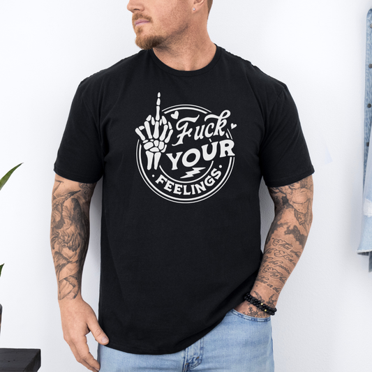 Male Model wearing a black Fuck Your Feelings Skeleton Hand Graphic Tee, showcasing the skeleton middle finger design and comfortable fit, purchase from Coffee and Moo NZ.