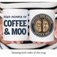Two white ceramic mugs held by hands against a black-and-white striped shirt background, showing both sides of the mug. The left mug reads 'HERD MEMBER OF COFFEE & MOO' in dark blue text, and the right mug has a circular seal design with cow hooves and the words 'Stay Feral and Coffee & Moo' and 'OFFICIALLY HOOF APPROVED COFFEE & MOO'. Grab your mug from Coffee and Moo NZ.