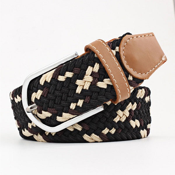Multi coloured woven belt with a brown faux leather trim and silver buckle on a white background. Purchase from Coffee and Moo