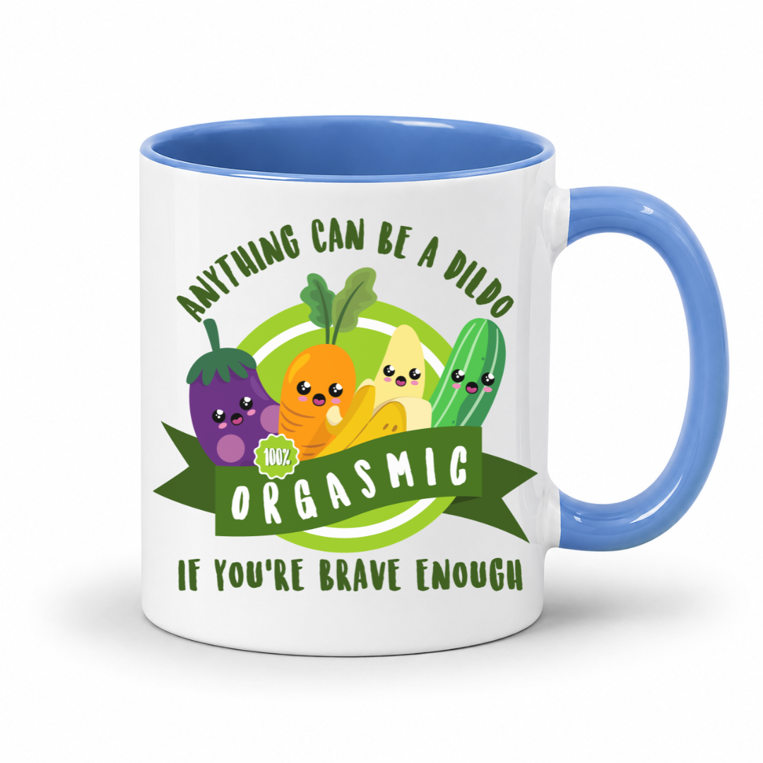 A white mug with a blue inner and handle, featuring an image of smiling cartoon vegetables and the words "Anything Can Be a Dildo If You're Brave Enough", Grab yours from from Coffee & moo nz.