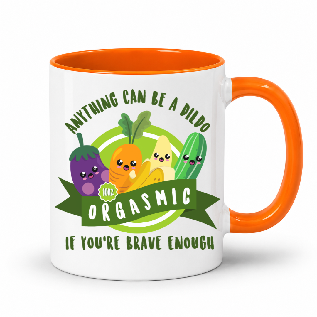 A white mug with a orange inner and handle, featuring an image of smiling cartoon vegetables and the words "Anything Can Be a Dildo If You're Brave Enough", Grab yours from from Coffee & moo nz.