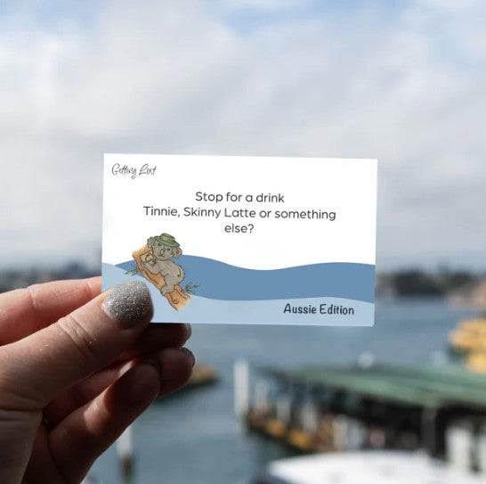 A card from the Getting Lost Aussie Edition Adventure Card Game featuring the text "stop for a drink, tinnie, skinny latte or something else". Purchase yours from Coffee and Moo NZ.