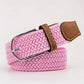 pink woven belt with a brown faux leather trim and silver buckle on a white background. Purchase from Coffee and Moo