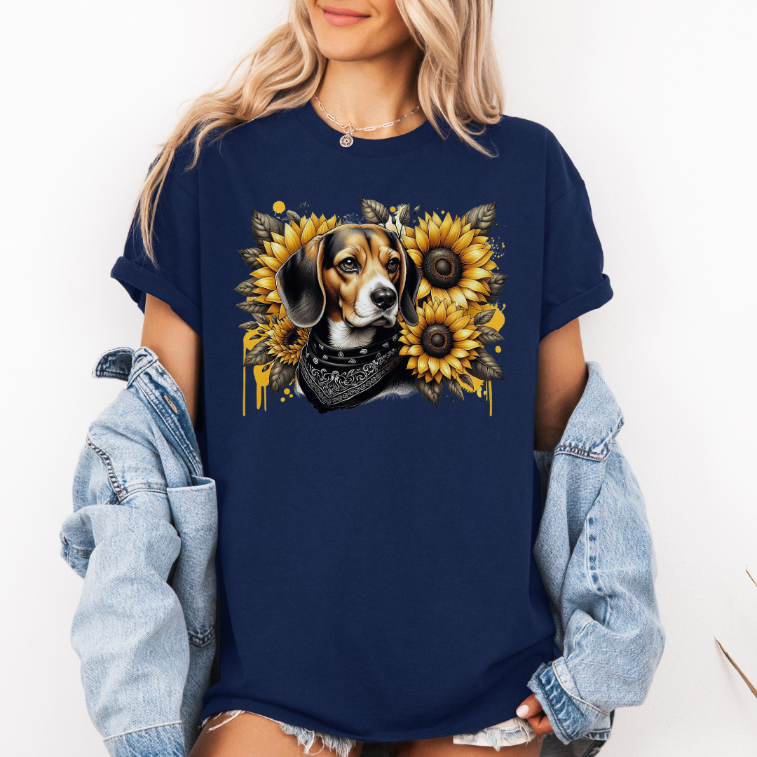A woman wearing an oversized navy blue graphic t-shirt with a beagle dog and sunflower design, styled with an open light-wash denim jacket. Grab your tee from Coffee and Moo.