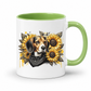 A white ceramic mug with a light green interior and handle, featuring a graphic print of a beagle dog wearing a black bandana and surrounded by yellow sunflowers. Grab your mug from Coffee and Moo NZ.
