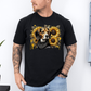 A man wearing a black short-sleeve t-shirt with a graphic print of a beagle dog surrounded by yellow sunflowers, paired with light blue jeans. Grab your tee from Coffee and Moo.