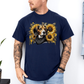 A man wearing a navy blue crewneck t-shirt with a graphic print of a beagle dog surrounded by yellow sunflowers and a black bandana. Grab your tee from Coffee and Moo.