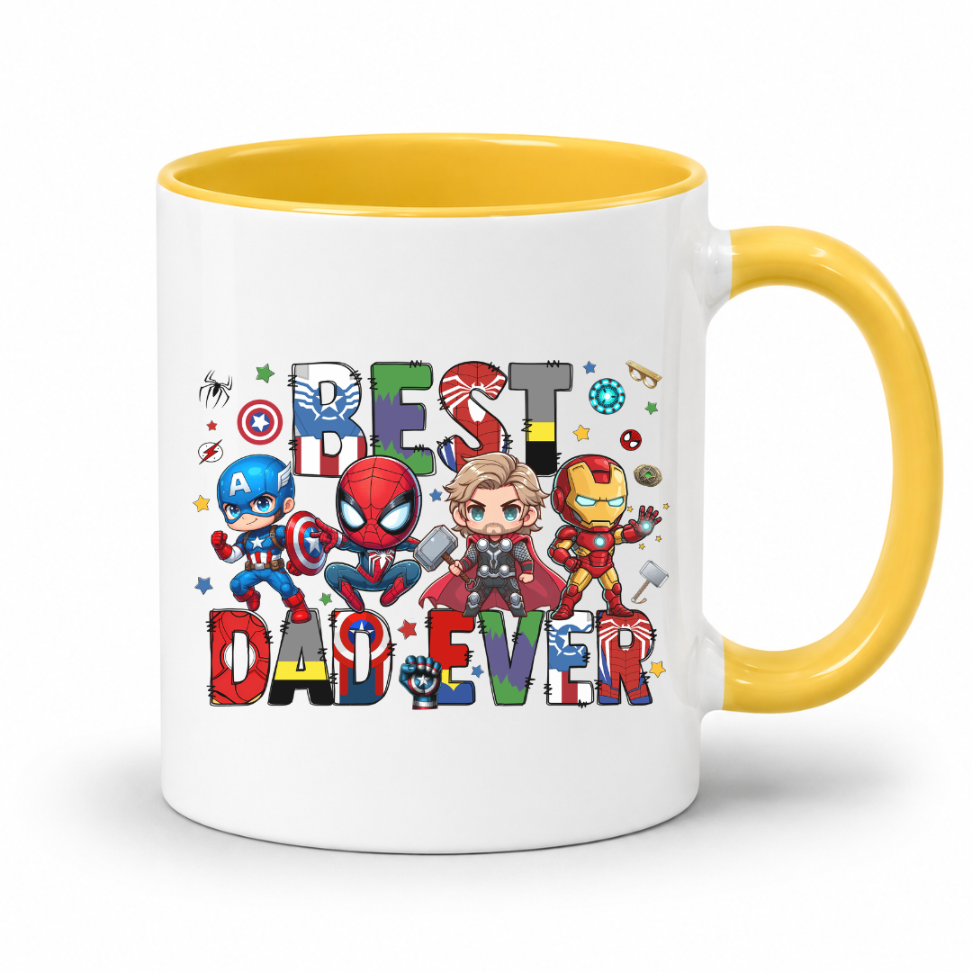 A white ceramic coffee mug with a yellow interior and handle, featuring a colorful graphic of chibi Marvel characters and the text 'BEST DAD EVER'. Grab yours from Coffee and Moo.