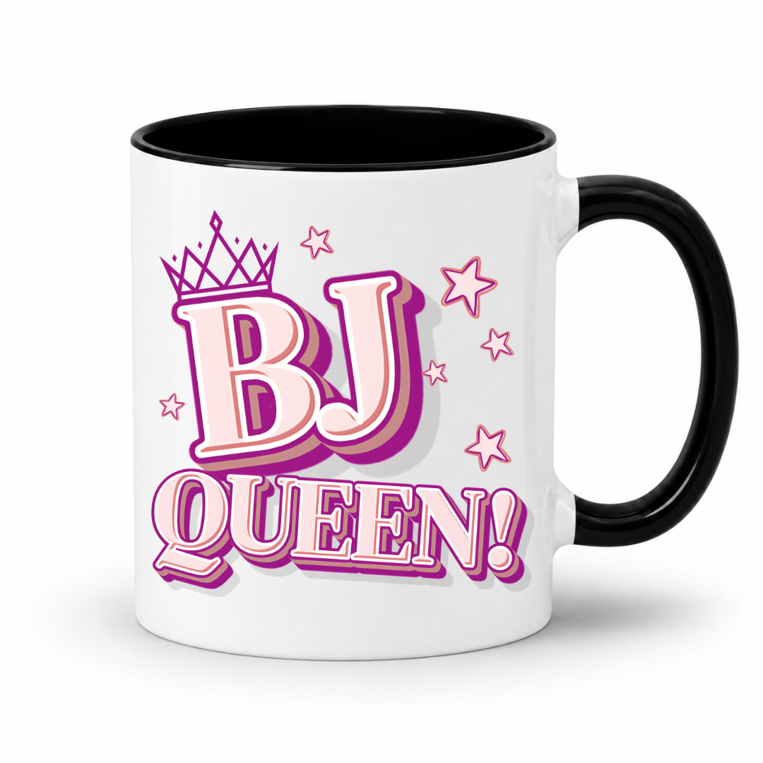White mug with a black inner and handle featuring bold pink and purple BJ Queen lettering, a crown and scattered stars, from Coffee and Moo.