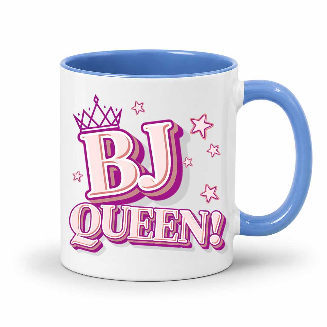 White mug with a blue inner and handle featuring bold pink and purple BJ Queen lettering, a crown and scattered stars, from Coffee and Moo.