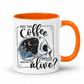 while mug with a orange handle and inner with a graphic on it that features a skull with one half showing a starry night sky with a crescent moon and a skeleton holding a coffee, accompanied by the text 'DOES THIS Coffee MAKE ME LOOK alive?'. Grab yours from Coffee and Moo NZ.