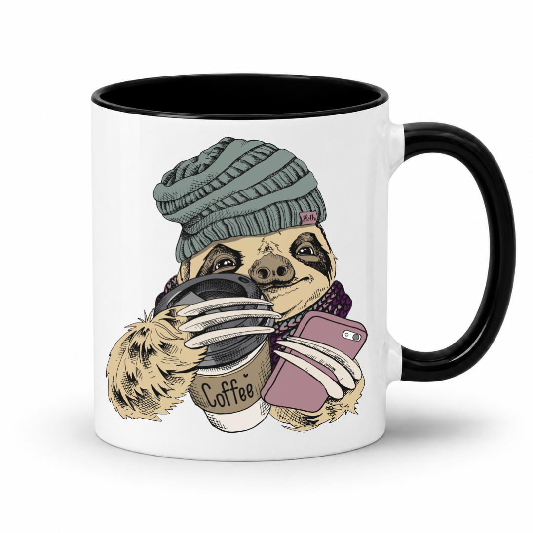 A white ceramic coffee mug with a black interior and handle, featuring a cartoon sloth wearing a green knit beanie and holding a coffee cup and a pink smartphone. Grab your mug from Coffee and moo NZ.