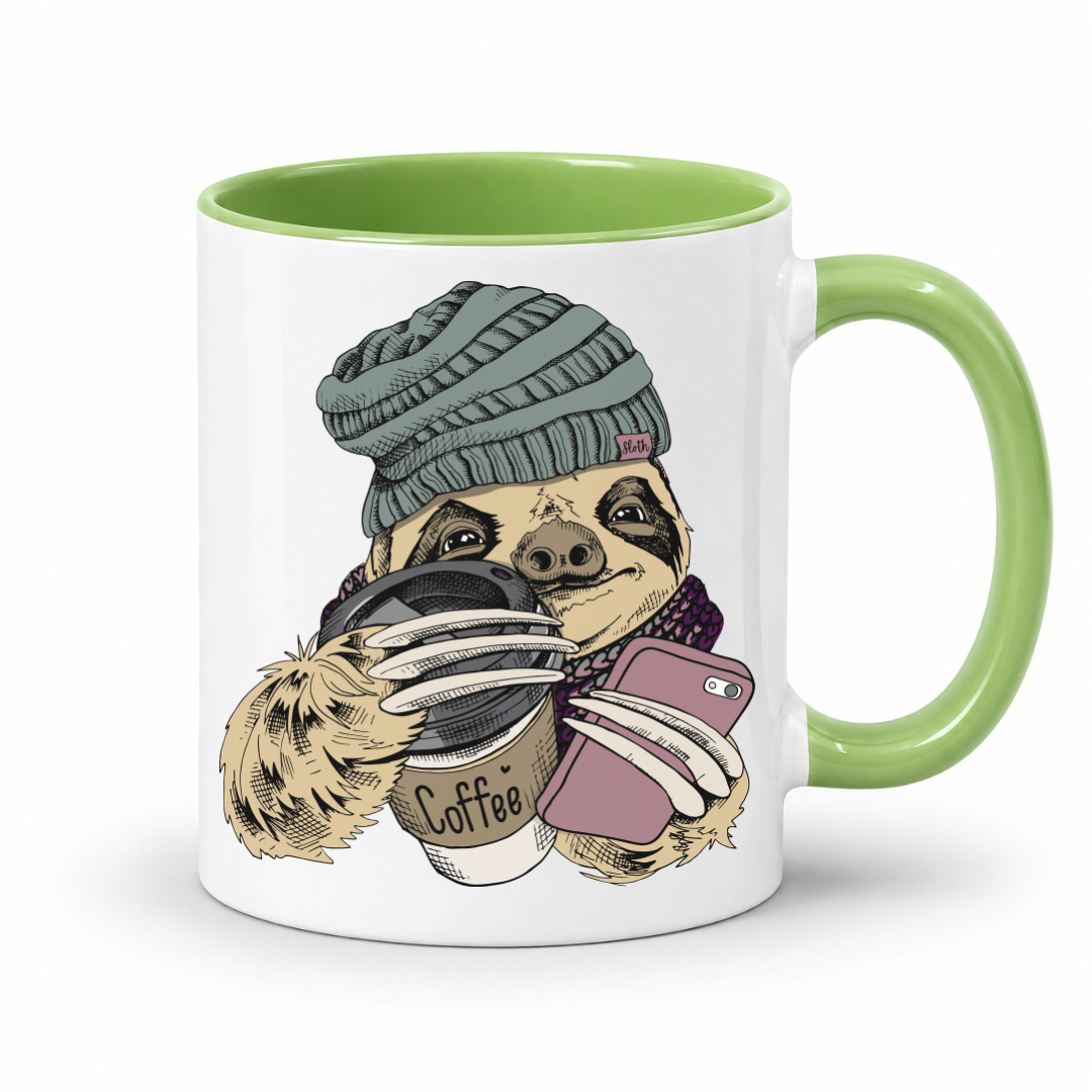 A white ceramic coffee mug with a light green interior and handle, featuring a cartoon sloth wearing a green beanie and holding a coffee cup and a pink phone. Grab your mug from Coffee and moo NZ.