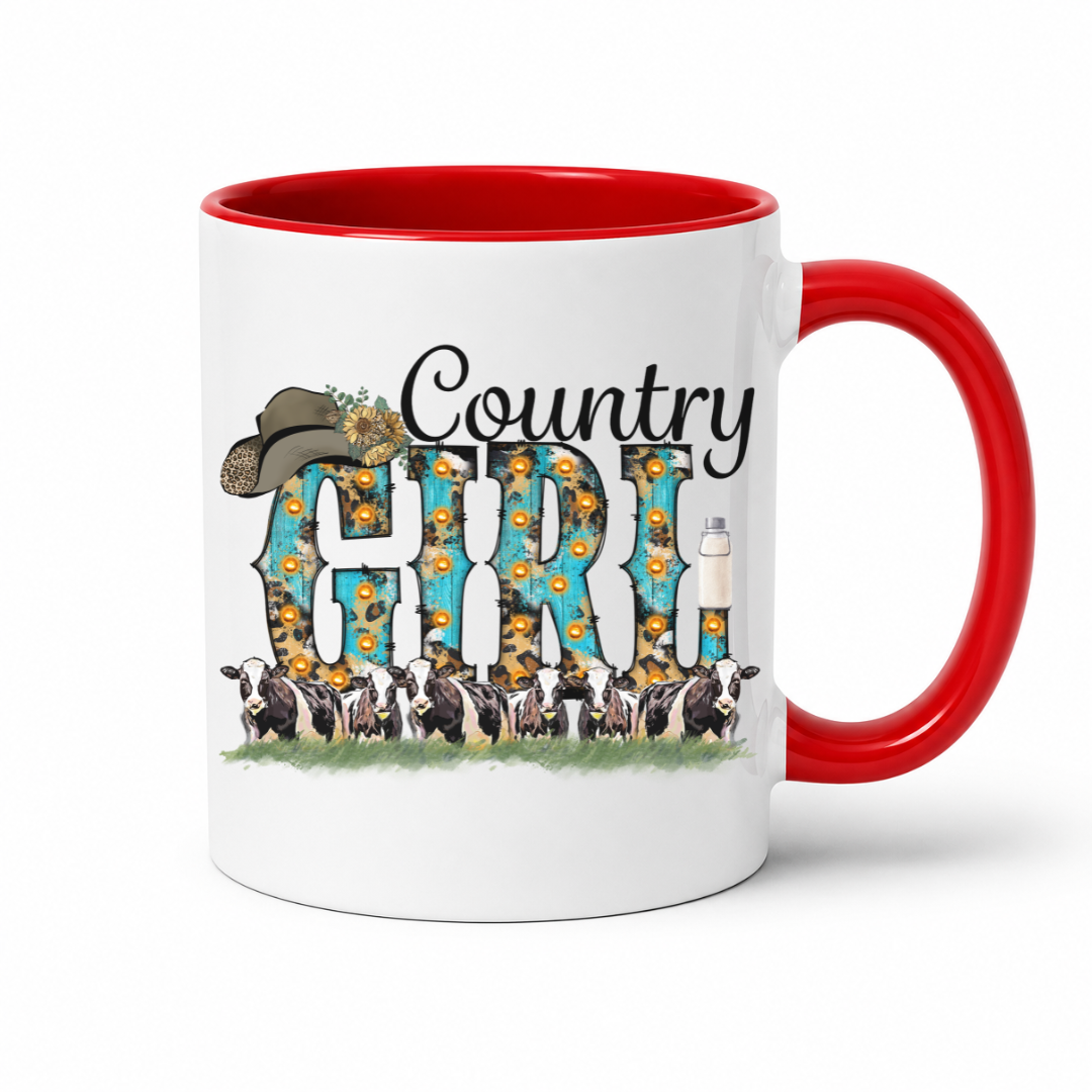 A white ceramic mug with a red interior and red handle, featuring a 'Country Girl' graphic with a cowboy hat, sunflowers, cows, and a lighthouse.  From Coffee and Moo NZ