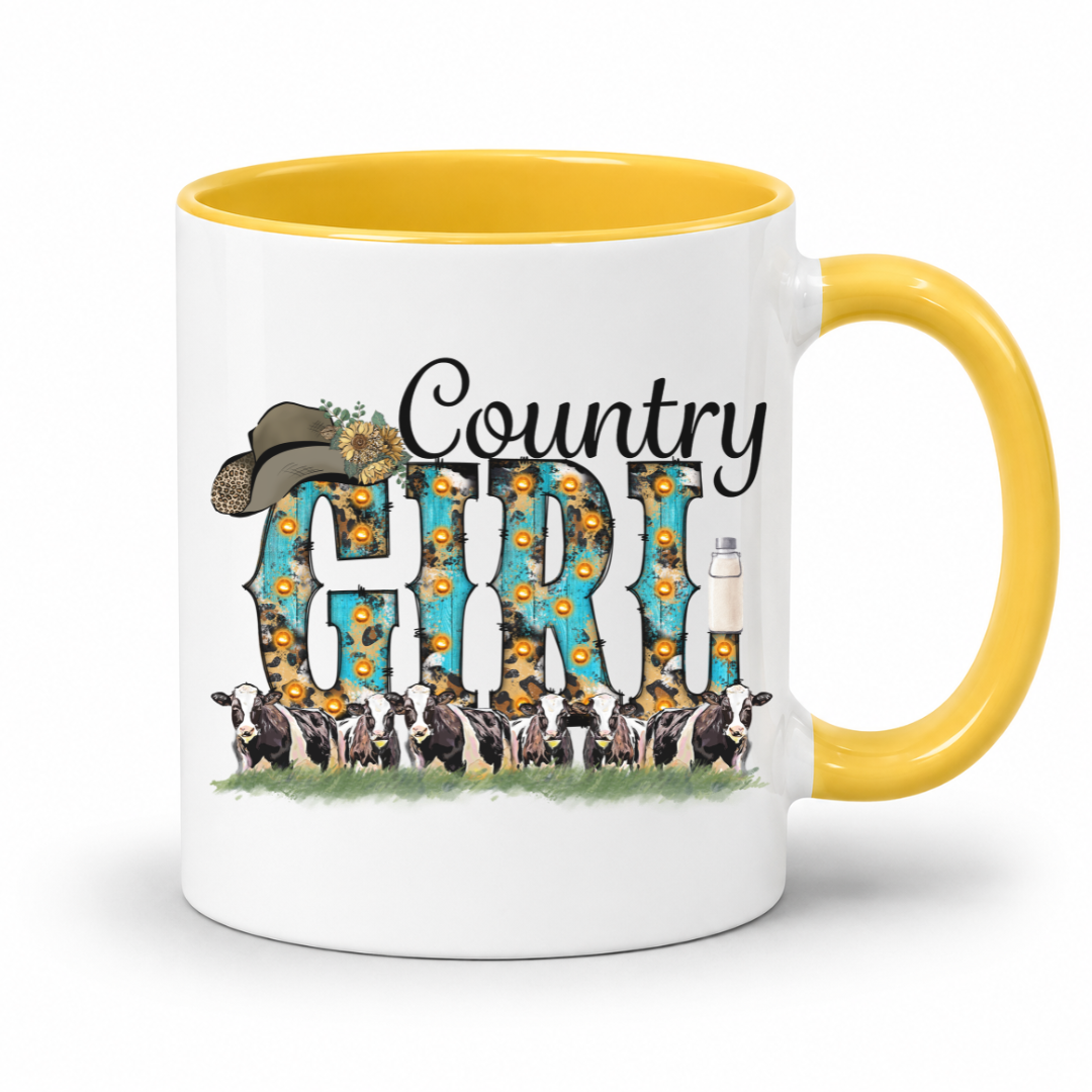 A white ceramic coffee mug with a yellow interior and handle, featuring a 'Country Girl' graphic with sunflowers, a cowboy hat, and a line of cows.  From Coffee and Moo NZ