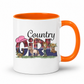 A white ceramic coffee mug with a bright orange handle and interior, featuring a 'Country Girl' graphic design on the front. From Coffee and Moo NZ.