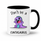 A white ceramic mug with a black handle and black interior, featuring a cartoon purple dinosaur graphic and the text 'Don't be a CUNTASaurus' on the front, shown on a clean white background. Grab yours from Coffee and Moo NZ.