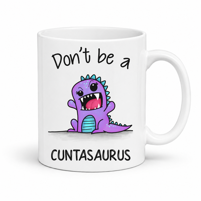 Don't Be a Cuntasaurus Funny Dinosaur Coffee Mug featuring the grumpy purple dinosaur and bold lettering design, Grab yours from Coffee and Moo.