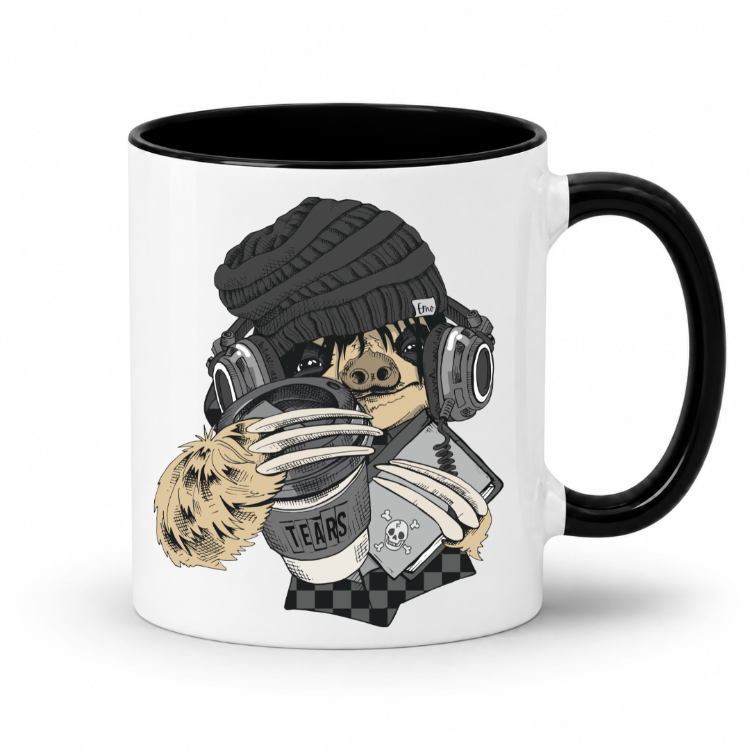 A white ceramic coffee mug with a black interior and black handle,  featuring a cartoon illustration of a sloth wearing a black knit beanie, over-ear headphones, and holding a cup with the word 'TEARS' on it and a diary, shown against a plain white background. Grab yours from Coffee and Moo NZ.