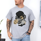 A man wearing a grey short-sleeve graphic t-shirt with a stylized Emo sloth wearing a beanie, headphones, and holding a coffee cup with the word "TEARS" on it. Grab your tee from Coffee and Moo NZ.