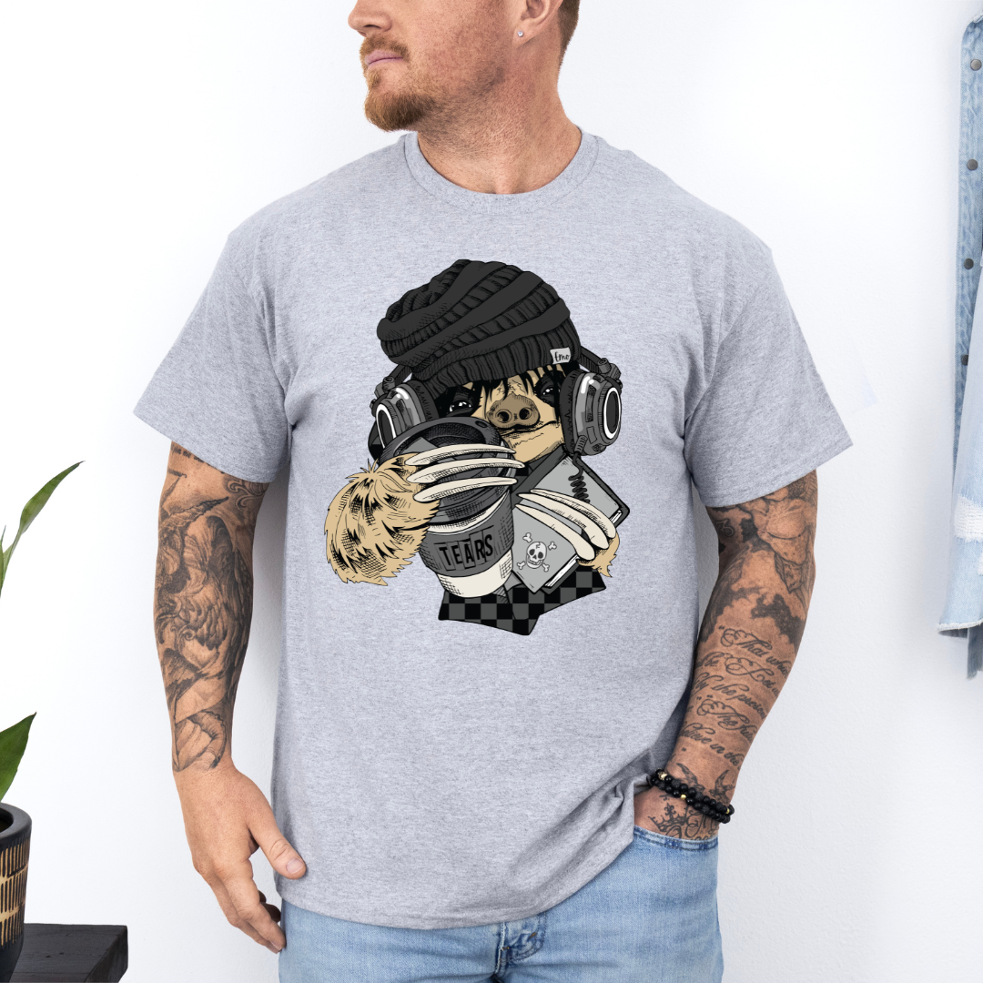 A man wearing a grey short-sleeve graphic t-shirt with a stylized Emo sloth wearing a beanie, headphones, and holding a coffee cup with the word "TEARS" on it. Grab your tee from Coffee and Moo NZ.