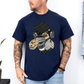 A man wearing a navy blue short-sleeve graphic t-shirt with a stylized Emo sloth wearing a beanie, headphones, and holding a coffee cup with the word "TEARS" on it. Grab your tee from Coffee and Moo NZ.
