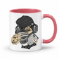 A white ceramic coffee mug with a pink interior and pink handle,  featuring a cartoon illustration of a sloth wearing a black knit beanie, over-ear headphones, and holding a cup with the word 'TEARS' on it and a diary, shown against a plain white background. Grab yours from Coffee and Moo NZ.