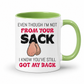A white ceramic mug with a green interior and handle, featuring a humorous graphic with the text 'EVEN THOUGH I'M NOT FROM YOUR SACK I KNOW YOU'VE STILL GOT MY BACK' and a cartoon drawing of hairy balls. Grab yours from Coffee and Moo NZ.