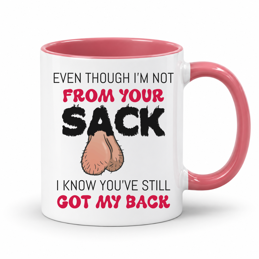 A white ceramic mug with a pink interior and handle, featuring a humorous graphic with the text 'EVEN THOUGH I'M NOT FROM YOUR SACK I KNOW YOU'VE STILL GOT MY BACK' and a cartoon drawing of hairy balls. Grab yours from Coffee and Moo NZ.