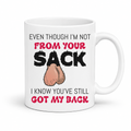 A white ceramic mug featuring a humorous graphic with the text 'EVEN THOUGH I'M NOT FROM YOUR SACK I KNOW YOU'VE STILL GOT MY BACK' and a cartoon drawing of hairy balls. Grab yours from Coffee and Moo NZ.