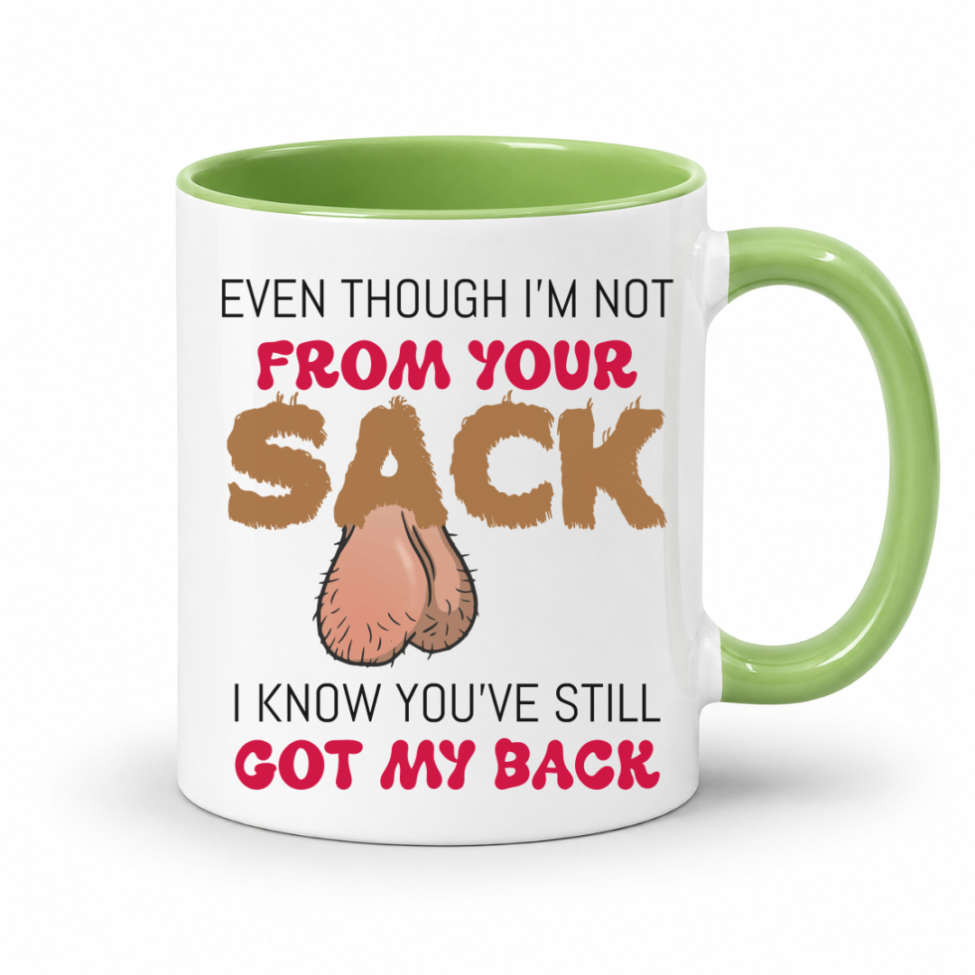 A white ceramic coffee mug with a light green handle and interior, featuring a humorous printed graphic with the text 'EVEN THOUGH I'M NOT FROM YOUR SACK I KNOW YOU'VE STILL GOT MY BACK' and a cartoon ball bags illustration. Grab yours from Coffee and Moo NZ.