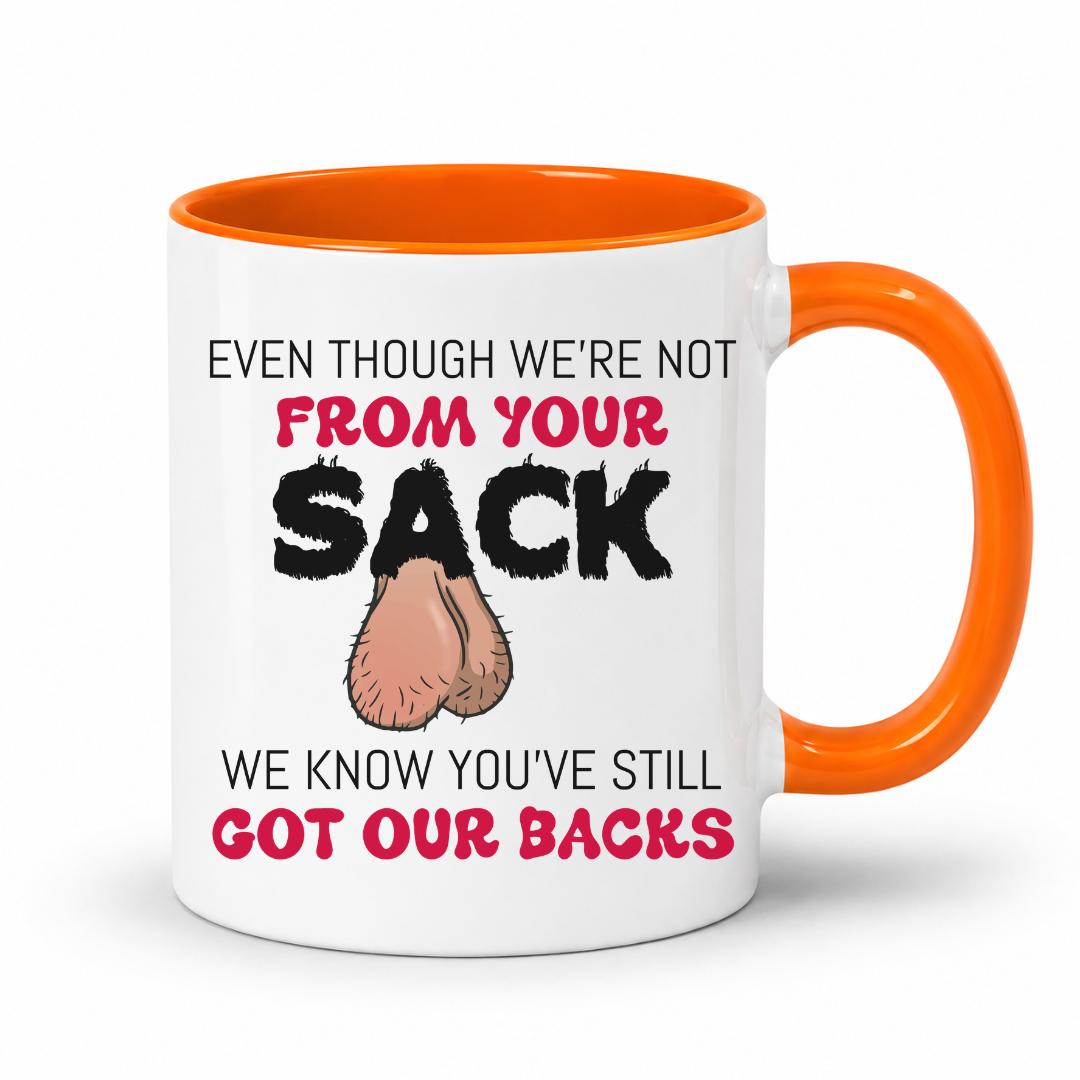 A white ceramic coffee mug with a orange interior and handle, has a humorous graphic. The mug features the text 'EVEN THOUGH WE'RE NOT FROM YOUR SACK WE KNOW YOU'VE STILL GOT OUR BACKS' in black and red lettering, accompanied by a cartoon drawing of a hairy balls. Grab your mug from Coffee and Moo NZ.
