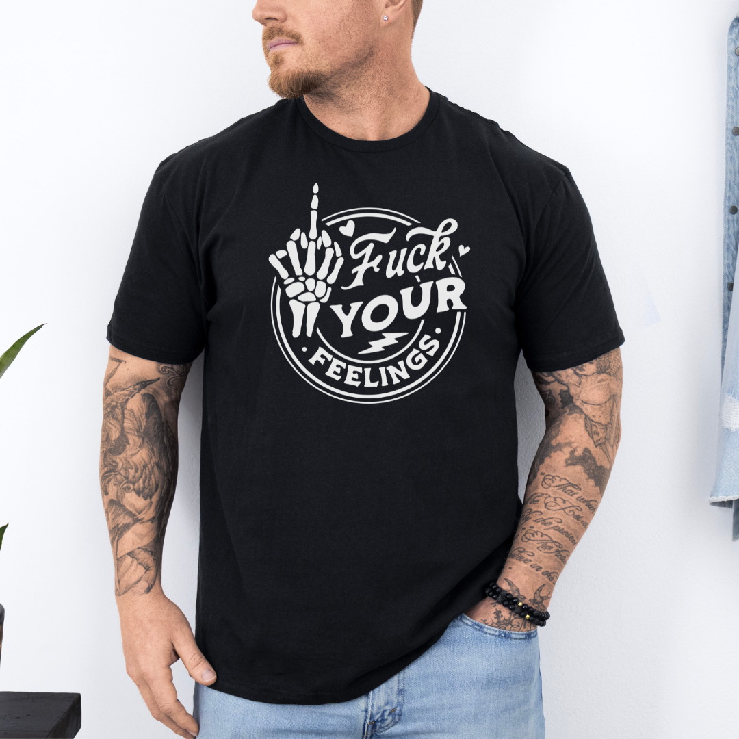 Male Model wearing a black Fuck Your Feelings Skeleton Hand Graphic Tee, showcasing the skeleton middle finger design and comfortable fit, purchase from Coffee and Moo NZ.