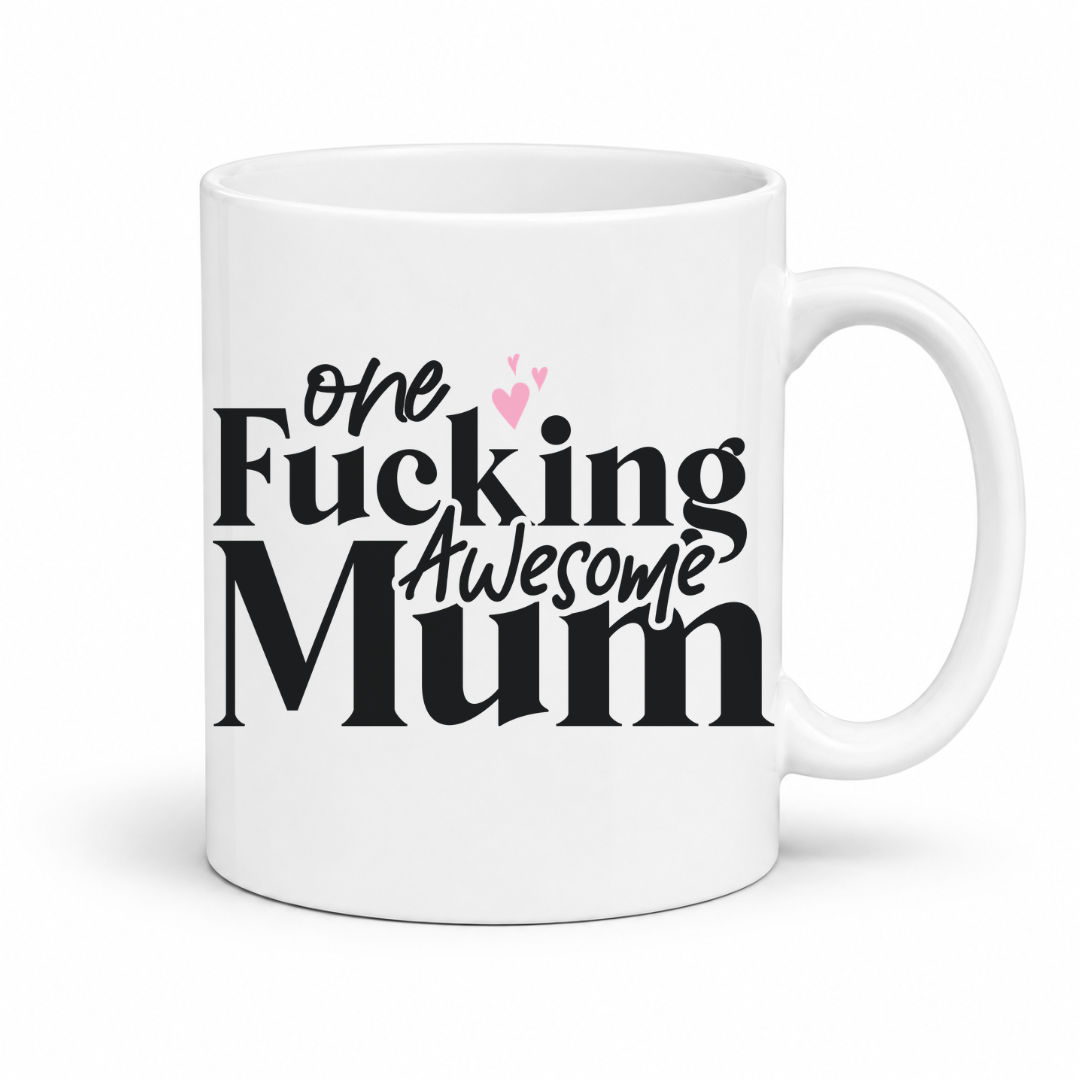 A white ceramic coffee mug with the text 'One Fucking Awesome Mum' printed on the front in black and pink lettering, set against a plain white background. From Coffee and Moo nz