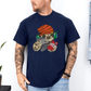 Male wearing a navy blue graphic T-shirt  featuring a colorful cartoon sloth wearing an orange knit beanie, green headphones, while holding a red phone and grey controller. Grab your tee from Coffee and Moo NZ.