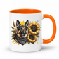 A white ceramic mug with a bright orange handle and interior, featuring a graphic print of a German Shepherd dog wearing a bandana next to yellow sunflowers. Grab your mug from Coffee and Moo NZ.