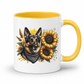 A white ceramic mug with a yellow interior and handle, featuring a graphic print of a German Shepherd dog wearing a bandana, surrounded by sunflowers and wheat. Grab your mug from Coffee and Moo NZ.