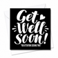 A square black greeting card with white script text reading 'Get Well Soon!' and smaller text '*YOU ATTENTION SEEKING TWAT', shown with white envelopes behind it on a white background. Grab your from Coffee and Moo NZ.