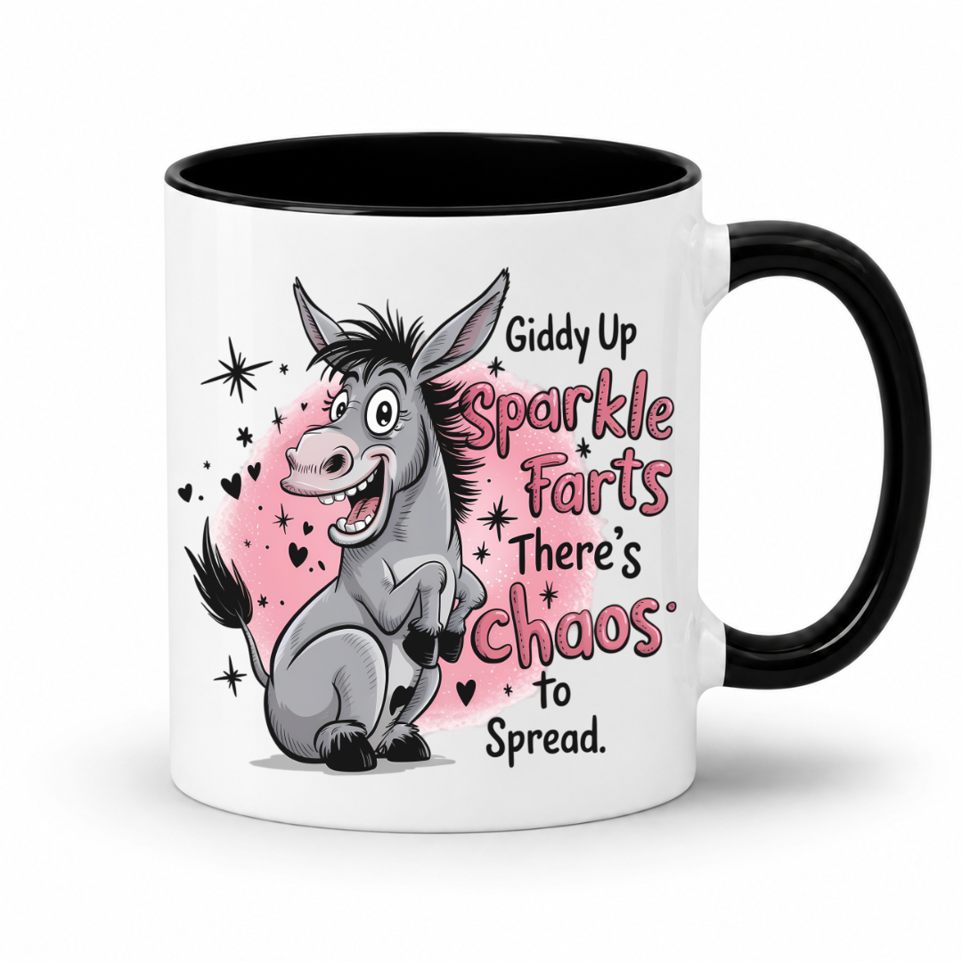 A white ceramic mug with a black interior and black handle, featuring a cartoon donkey graphic and the text 'Giddy Up Sparkle Farts There's Chaos to Spread.' on a clean white background. from Coffee and Moo.
