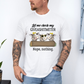 A man wearing a white graphic t-shirt with a cartoon cow design and the text 'Let me check my GIVEASHITMETER Nope, nothing.' Grab your from Coffee and Moo NZ.