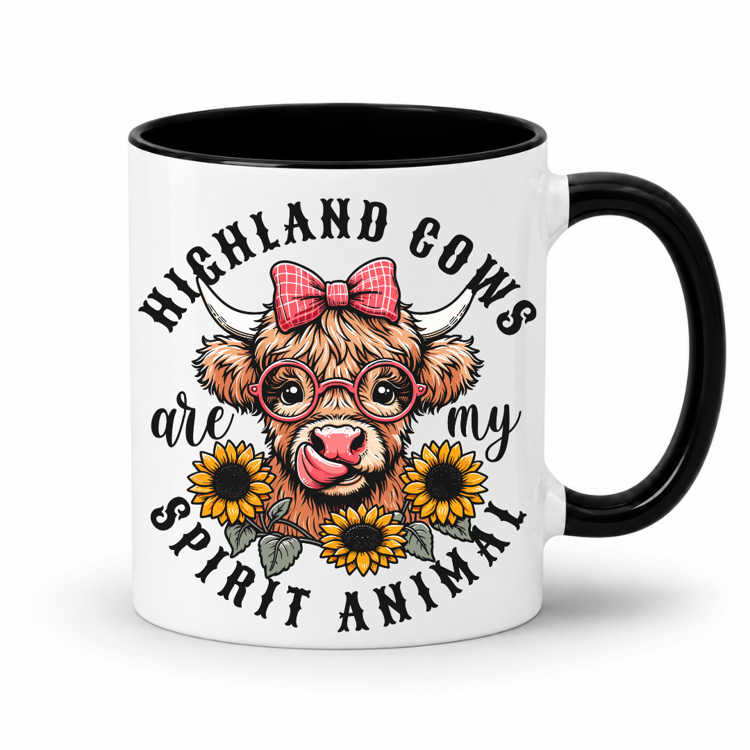 A white ceramic coffee mug with a black interior and handle, featuring a cute cartoon illustration of a Highland cow wearing round glasses and a pink bow, surrounded by yellow sunflowers. The text reads 'HIGHLAND COWS are my SPIRIT ANIMAL'. from Coffee and Moo NZ.