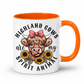 A white ceramic mug with a bright orange handle and interior, featuring a cartoon illustration of a highland cow wearing round glasses and a pink bow, surrounded by sunflowers, with the text 'HIGHLAND COWS are my SPIRIT ANIMAL'. from Coffee and Moo NZ.