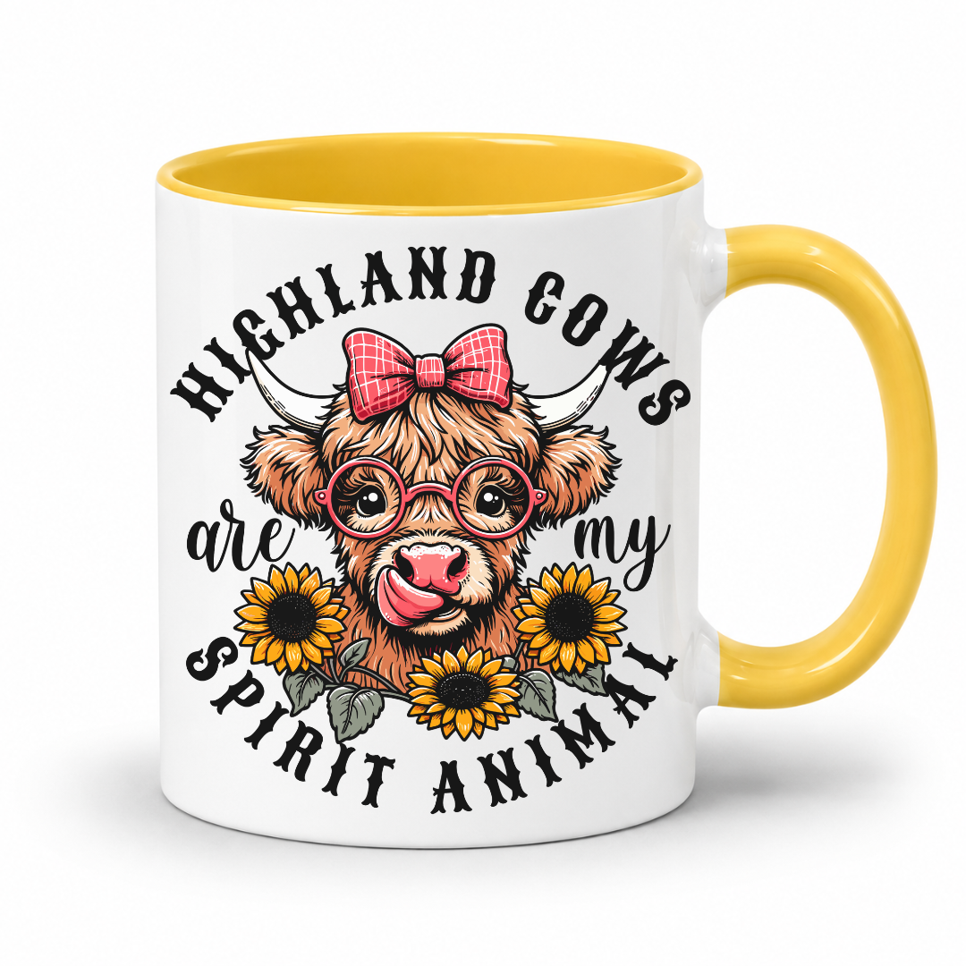 A white ceramic mug with a yellow interior and handle, featuring a cartoon illustration of a Highland cow wearing glasses and a pink bow, surrounded by sunflowers and the text 'HIGHLAND COWS are my SPIRIT ANIMAL'. from Coffee and Moo NZ.