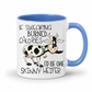 A white ceramic coffee mug with a blue interior and handle, featuring a cartoon cow and the text 'IF SWEARING BURNED CALORIES I'D BE ONE SKINNY HEIFER' on a white background. purchase from Coffee and Moo NZ.