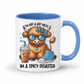 A white ceramic coffee mug with a blue interior and handle, featuring a cartoon highland cow wearing sunglasses and a bow tie, with the text 'I'M NOT A HOT MESS' and 'IM A SPICY DISASTER'. from Coffee and Moo NZ.