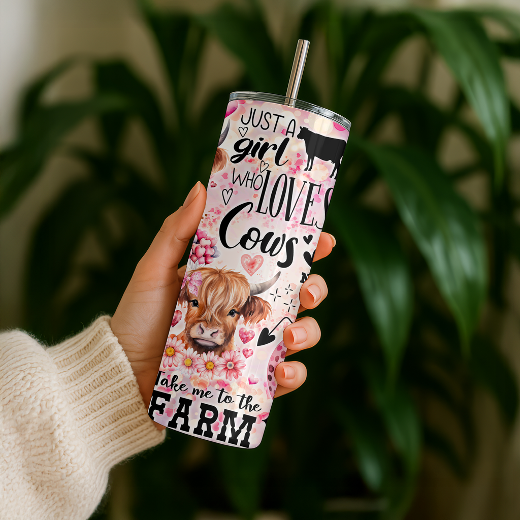 a person holding a Just a Girl Who Loves Cows Highland cow tumbler, featuring fluffy cows, pink hearts, flowers and funny cow-themed sayings, from Coffee & Moo.